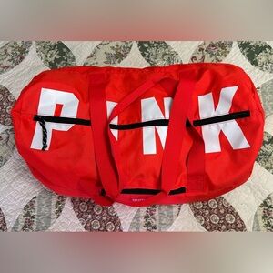 Pink duffle bag